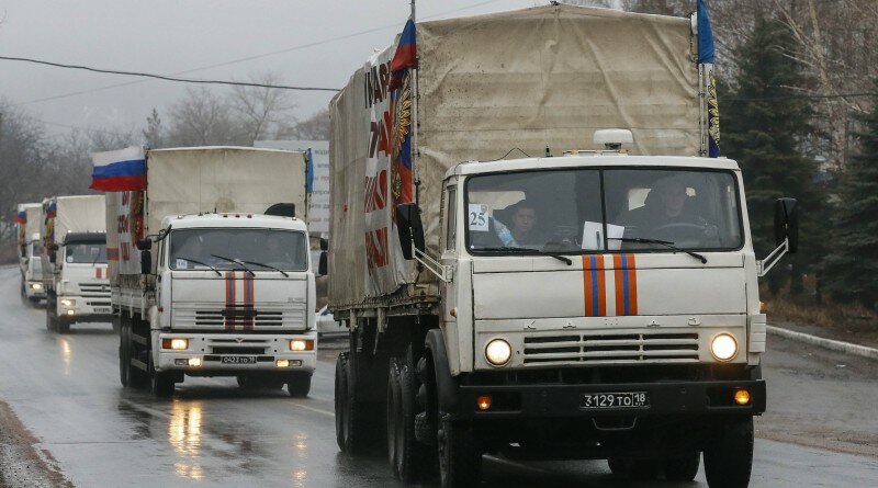 A Russian convoy of trucks carrying humanitarian aid for Ukraine are seen in Makiivka (Makeyevka) in Donetsk region, December 12, 2014. According to Russian media, over 50 trucks arrived in Donetsk while another 80 trucks arrived in Luhansk. REUTERS/Maxim Shemetov (UKRAINE - Tags: POLITICS CONFLICT SOCIETY)
