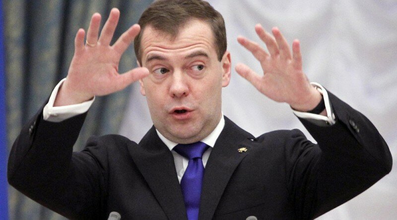 Russia's President Dmitry Medvedev gestures as he delivers a speech during an awards ceremony at the Kremlin in Moscow December 29, 2011. REUTERS/Misha Japaridze/Pool (RUSSIA - Tags: POLITICS)